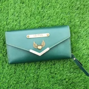 Elegant ladies clutch in green colour for party and events