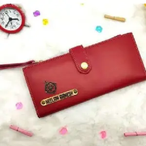 Stylish ladies 2 fold button wallet in wine red colour with compartments