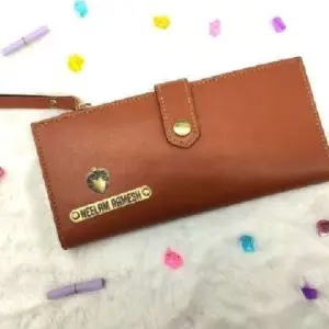 Stylish ladies 2 fold button wallet in tan brown colour with compartments