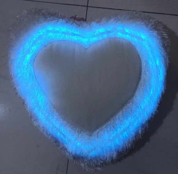 Blue LED Fur Pillow with heart-shaped design, personalized photo printing area, soft white fur fabric, glowing blue illumination, romantic gift for anniversaries and special occasions.