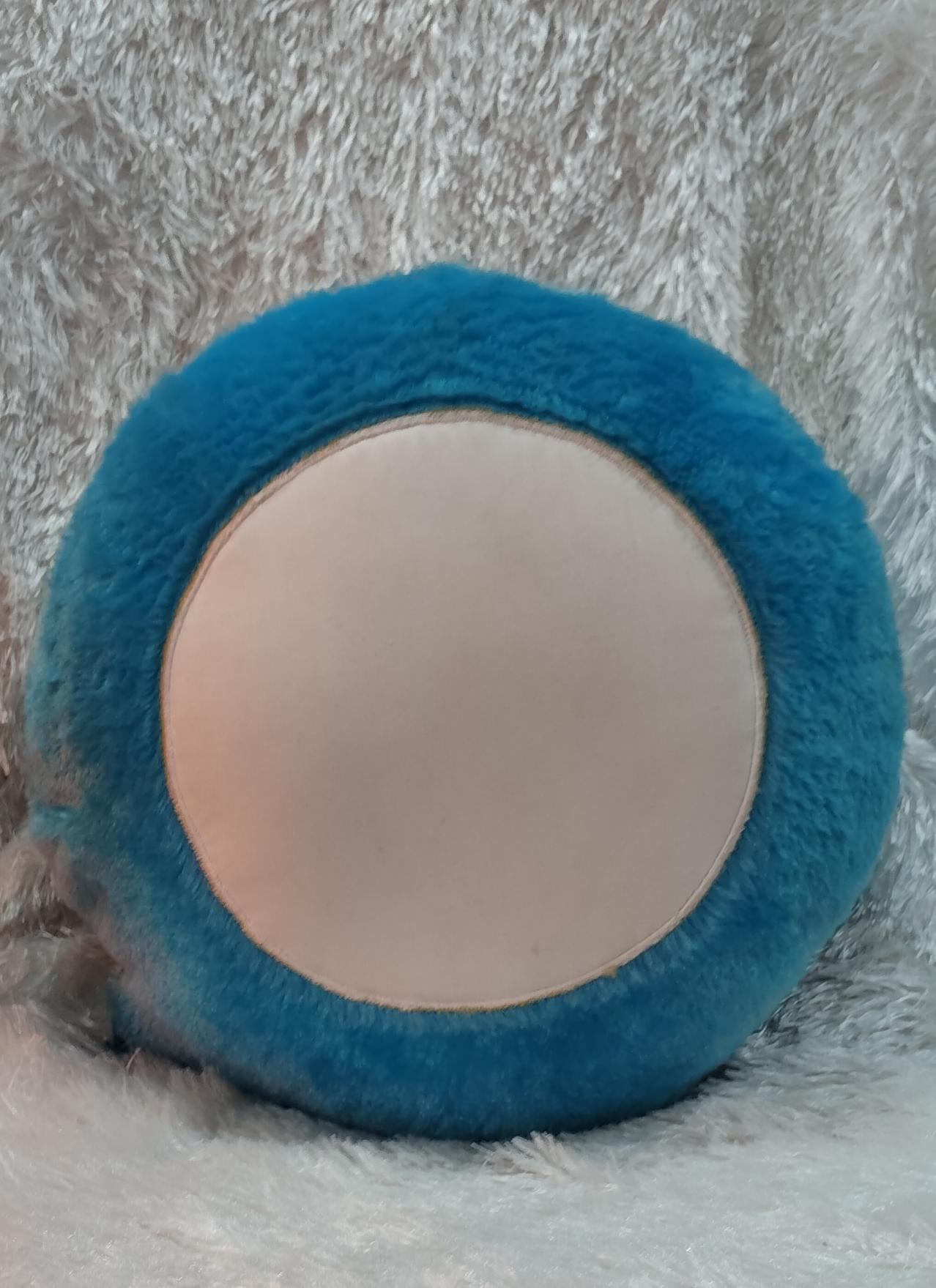 Soft Doraemon face cushion made from plush fabric for kids room decoration and gifting.