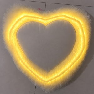 Yellow LED Fur Pillow with heart-shaped design, personalized photo printing area, soft white fur fabric, glowing yellow illumination, romantic gift for anniversaries, Valentine's Day, and special occasions.