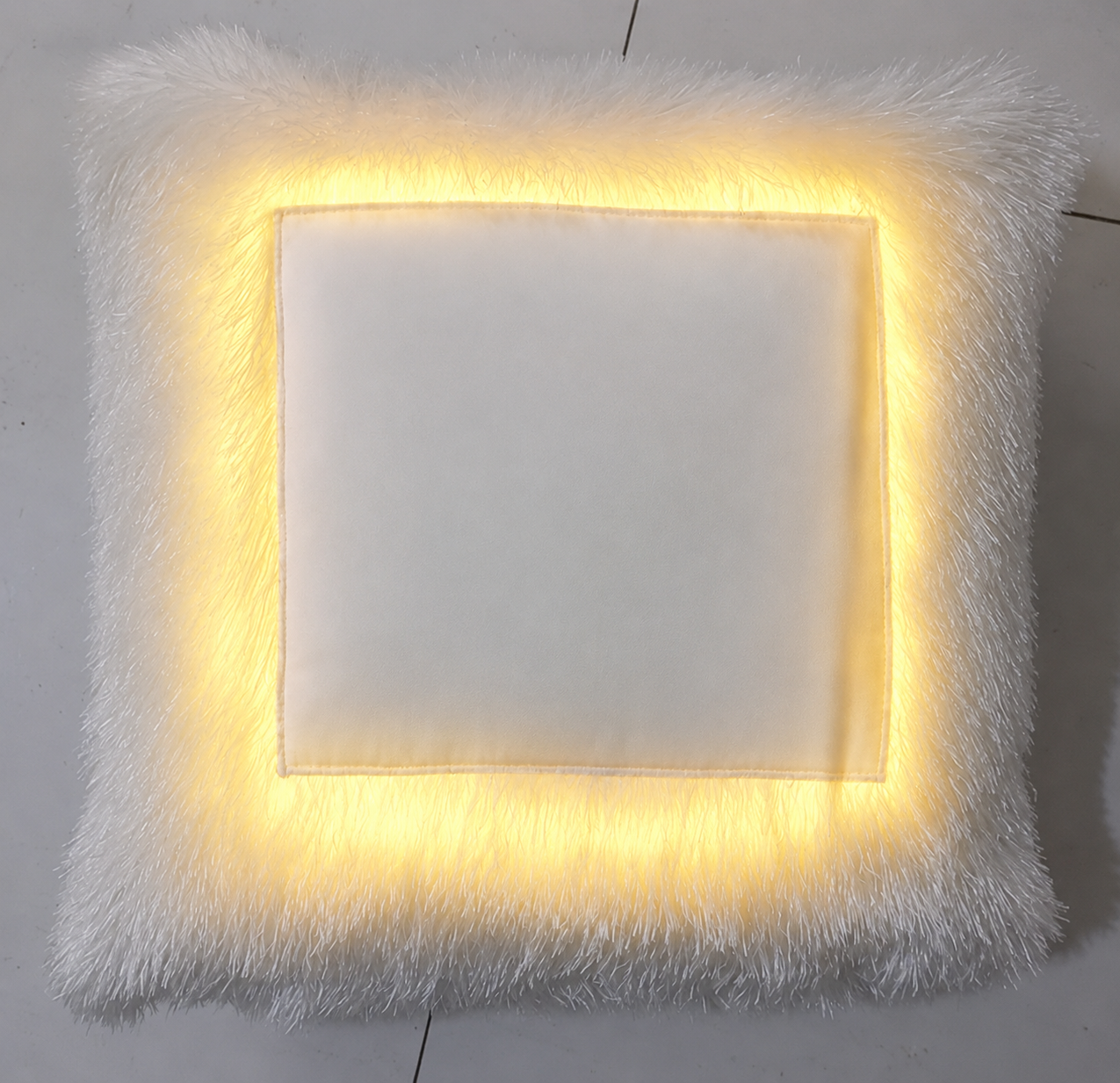 Yellow LED photo pillow with custom photo printing, warm glowing yellow light border, soft furry fabric, and personalized cushion design for gifting and home décor.
