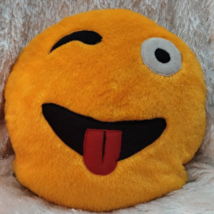 Yellow emoji cushion made with soft plush fabric featuring a playful winking smiley face design for gifting and home decoration.