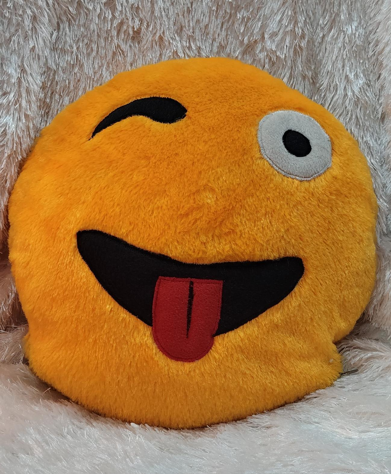 Yellow emoji cushion made with soft plush fabric featuring a playful winking smiley face design for gifting and home decoration.